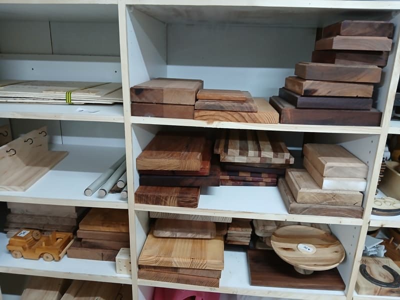 Shelves of assorted serving and cheese boards